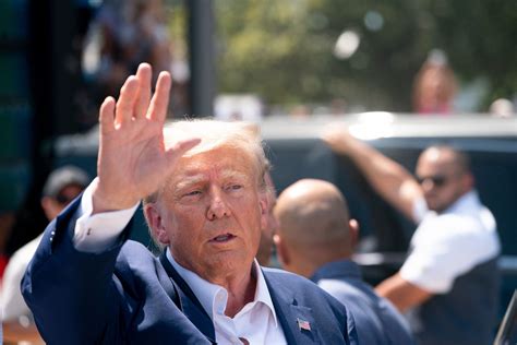 donald trump loudly booed  cheered  iowa football crowd newsweek