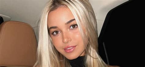 Olivia Dunne Wows With Bikini Gymnastics On The Beach