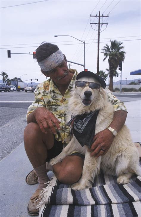 A homeless man and his dog editorial stock image. Image of homelessness ...