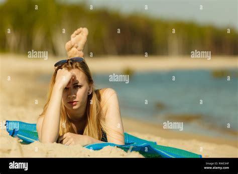 Summertime pleasures, enjoying vacation concept. Woman in bikini