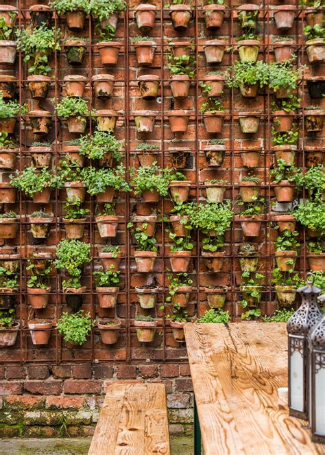 Design sleuth vertical garden of terra cotta pots – Artofit