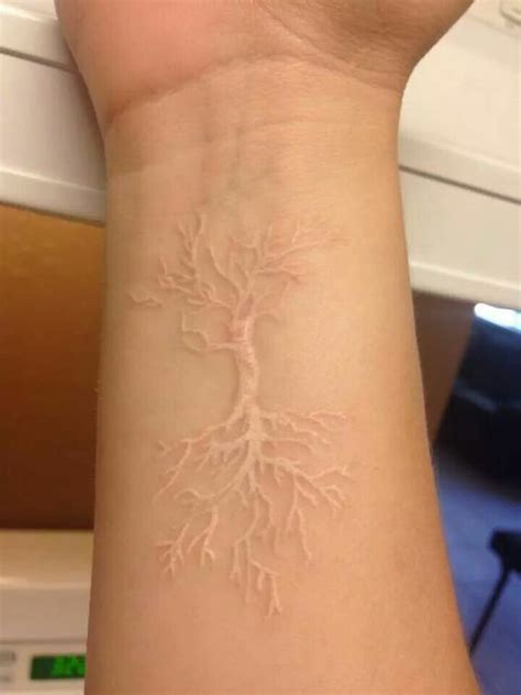 White inked tree tattoo with roots | www.otziapp.com | Skin color ...