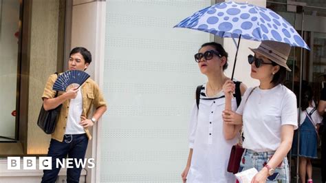 Japan heatwave: Temperature breaks national record - BBC News
