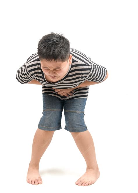 Premium Photo | Obese boy having a severe stomach ache and screaming or