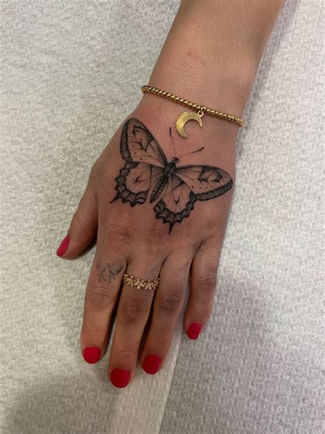 Hand tattoo butterfly | Butterfly hand tattoo, Back of hand tattoos ...