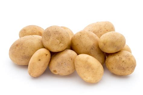 Premium Photo | New potato isolated on white surface.