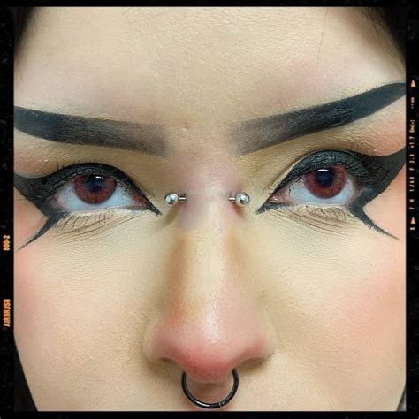 bridge piercing idea cool piercings facial piercings piercing ideas