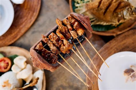 premium photo close   traditional delicious indonesian sate