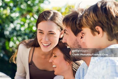 Family Laughing Together Outdoors High-Res Stock Photo - Getty Images