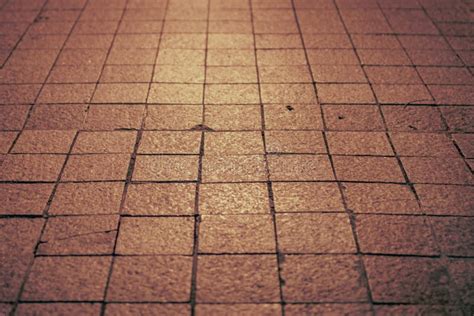 night view  square tiled pavement  dim lighting stock image