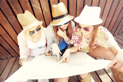 Group of tourists using map in the city 15809686 Stock Photo at Vecteezy