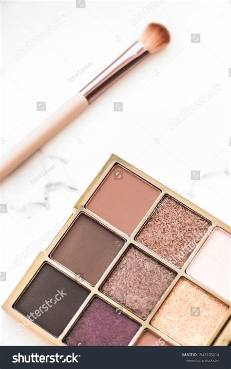 Eye Shadow Palette Swatches on Marble Background