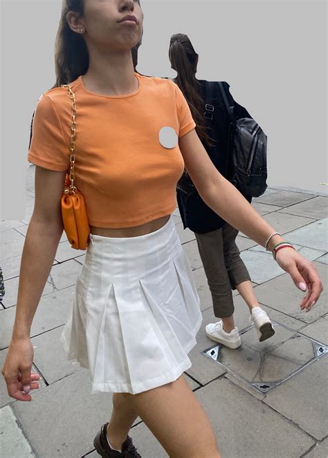 Great Pair of puffies in orange top - boobs - Forum