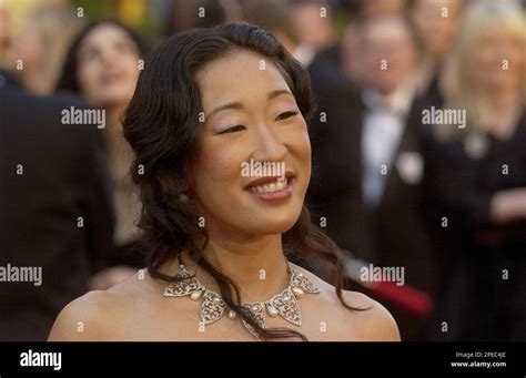 Actress Sandra Oh, of the film "Sideways," arrives for the 77th annual ...