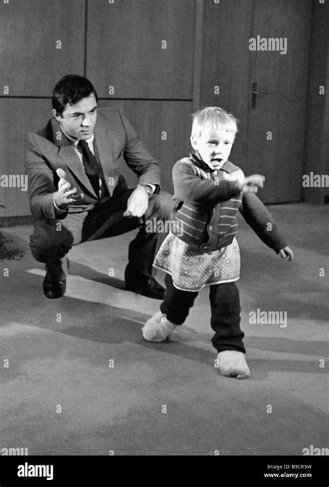 Microsurgeon Ramaz Datiashvili right and a 3 year old Lithuanian girl ...