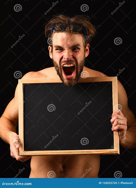 Man with Beard and Tousled Hair Black Background. Man Muscular Torso