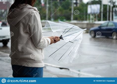 Asian Woman Opening Closing an Umbrella while Waiting Taxi and Standing ...