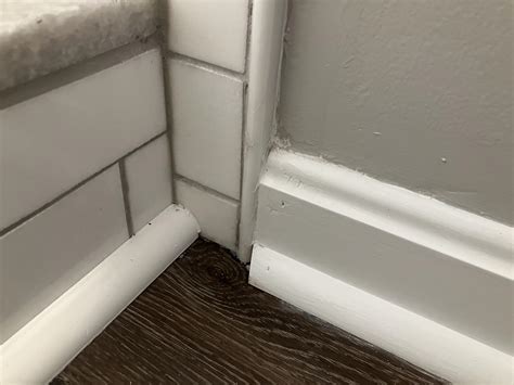 Any way to make this baseboard/quarter round look more normal, or leave it alone? : r/Flooring