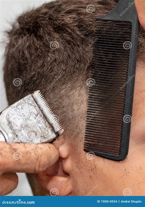 The Boy is Trimmed with a Trimmer Stock Photo - Image of kids ...