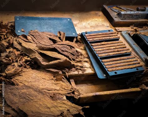 Cigar rolling Stock Photo | Adobe Stock