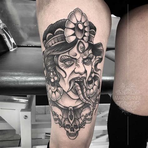 Kali Tattoos: Meanings, Common Themes & Artists