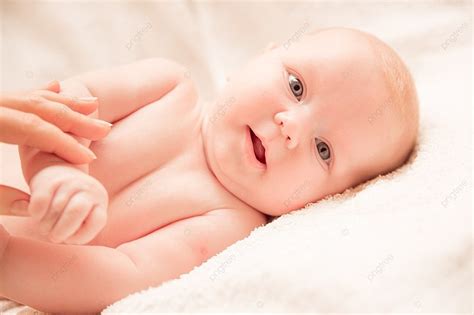 Two Month Old Baby Girl On A Light Background, Smiling, Indoors, Dress ...