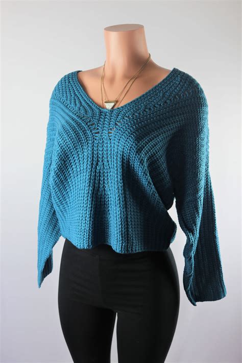 teal color sweater