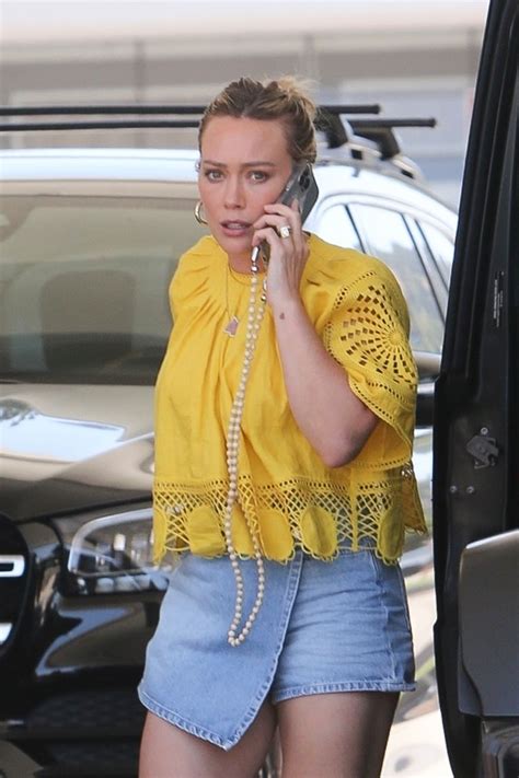 HILARY DUFF in a Denim Skirt at a Gas Station in Los Angeles 07/07/2023