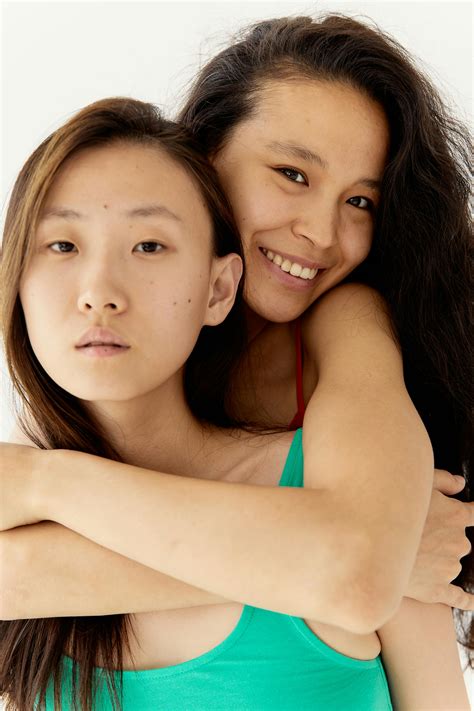 A Nude Man and Woman Filled with Oil Hugging · Free Stock Photo