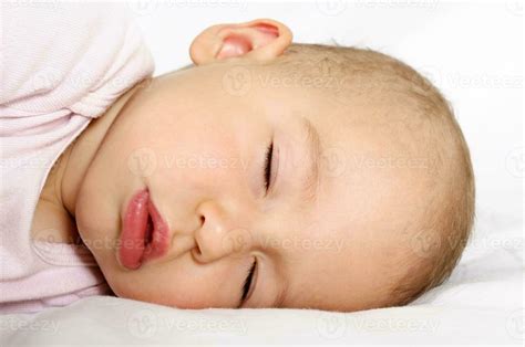 Cute baby sleeping 23301703 Stock Photo at Vecteezy