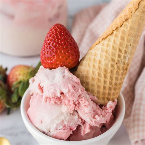 ninja creami strawberry ice cream  condensed milk fork  spoon