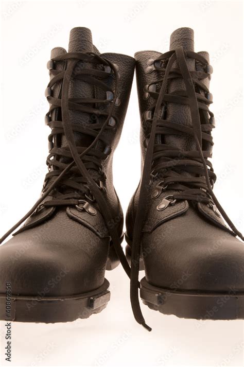 Black army/military boots on white background Stock Photo | Adobe Stock