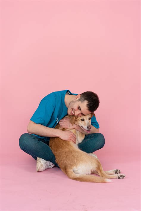 Woman Hugging Her Dog · Free Stock Photo