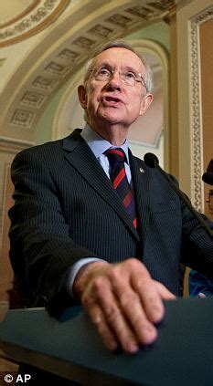 Senator Harry Reid attacks Mitt Romney over their shared faith, declaring that 'he is not the ...