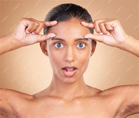 Premium Photo | Beauty surprise portrait and woman forehead wrinkles