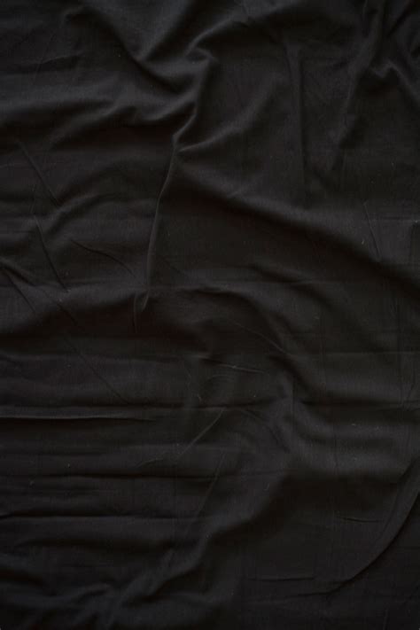 black bed sheet jaroslava snajberkova photography