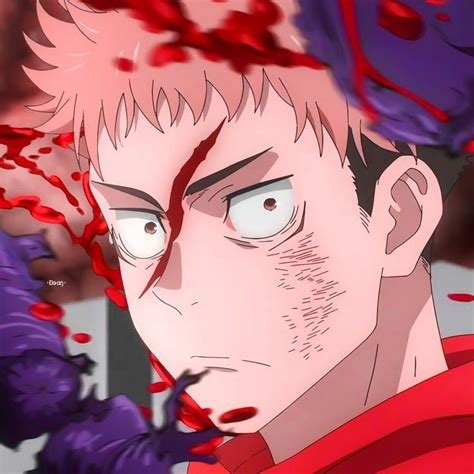 a man with red hair and blue eyes staring at something in the air while ...