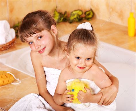 Kids washing in bath. — Stock Photo © poznyakov #5908655