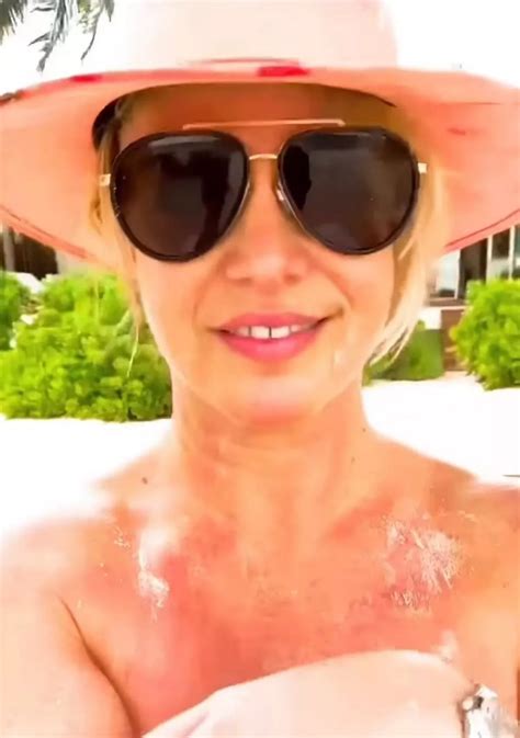 Britney Spears tells fans she's 'cut all her hair off' as she goes