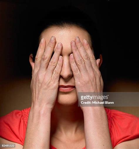 covering eyes   premium high res pictures getty images