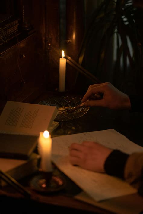 Person Holding White Candle Stick · Free Stock Photo