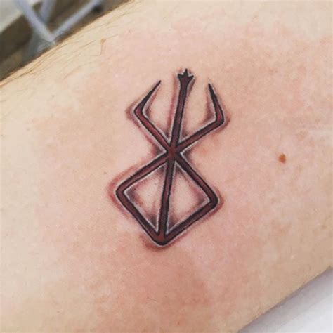 Top more than 74 berserker symbol tattoo super hot - in.cdgdbentre