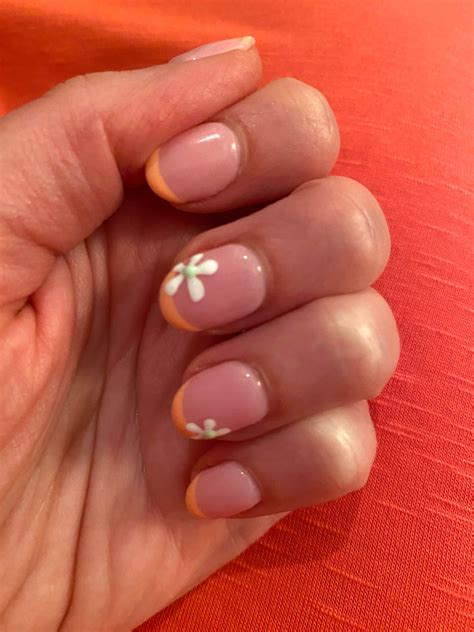 Orange French Tips Nails Manicure With Flowers Design – Vibrant Guide