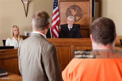 accused criminal  lawyer   courtroom high res stock photo getty
