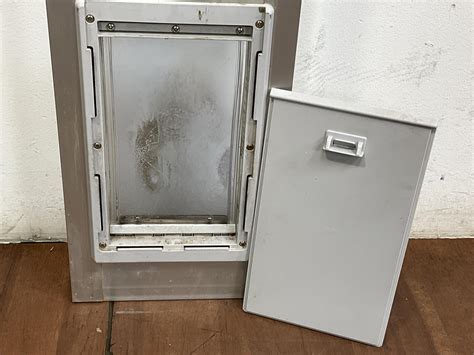 Lot - Ideal Pet Products Sliding Glass Door Pet Door