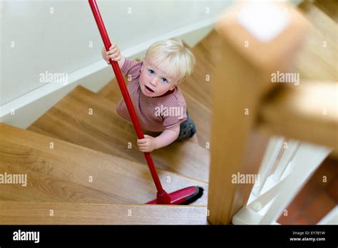 Boy Cleaning Stairs High Resolution Stock Photography and Images - Alamy