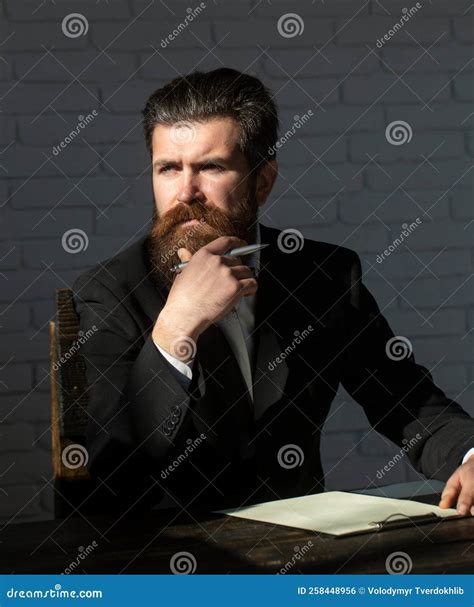 Portrait of a Teacher or Professor at Classroom. Satisfied Serious