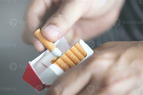 peel it off Cigarette pack prepare smoking a cigarette. Packing line up ...