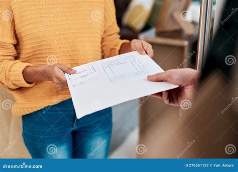 And Heres Your Copy of the Receipt. a Woman Receiving an Invoice for a 