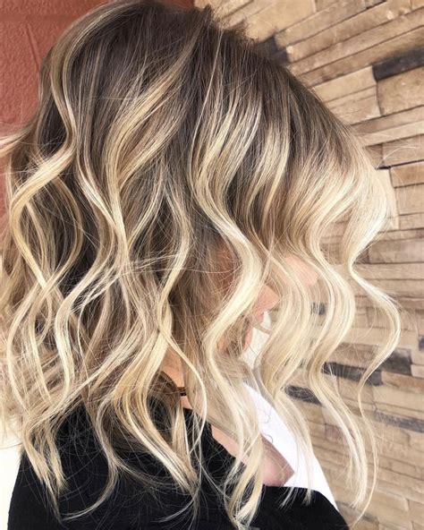 Beautiful ashy balayage with the perfect smudge root fading into bright